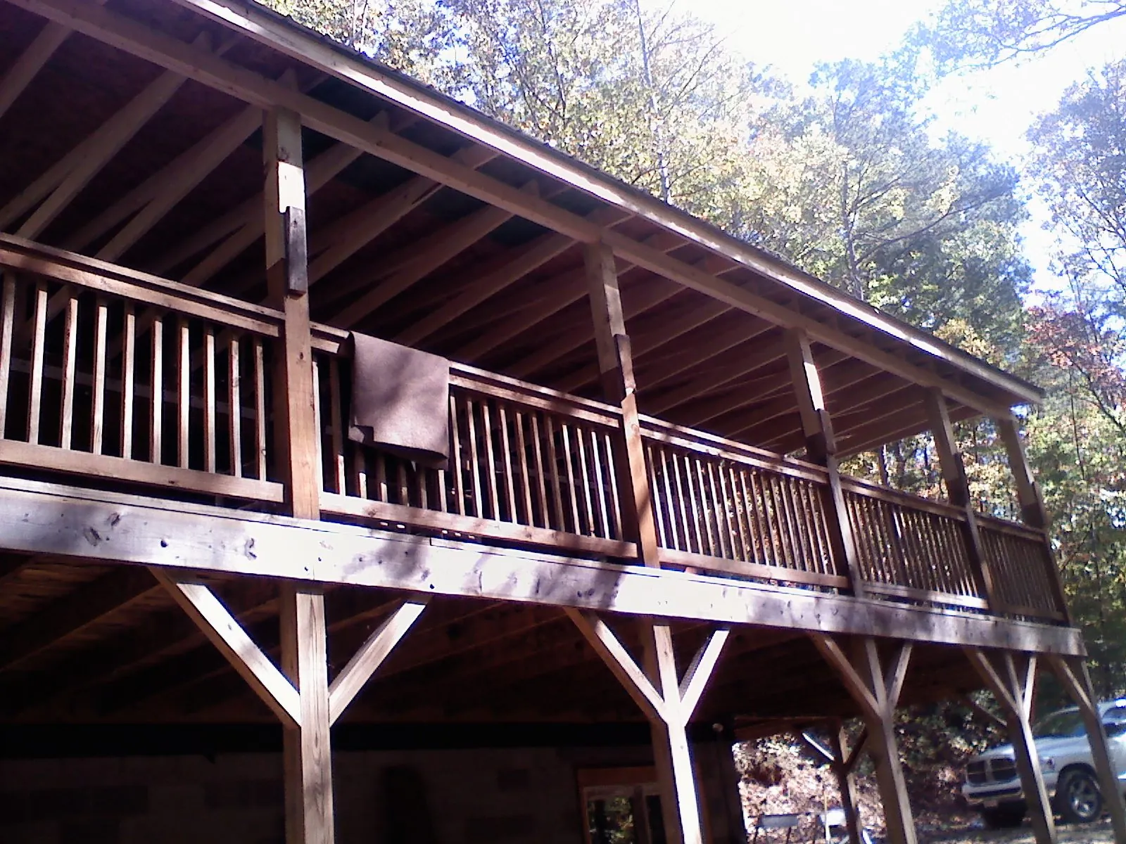 Timber framing under a new elevated porch and deck — Roof Leak Repair in Flournoy by Roofing Brothers